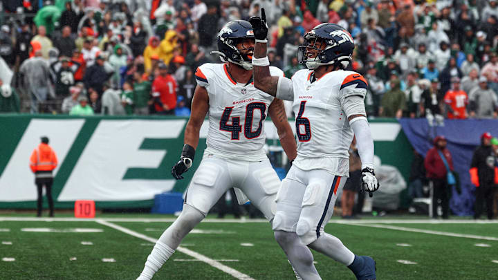 Denver Broncos safety P.J. Locke (6) celebrates a fourth quarter, fourth down defensive stop.
