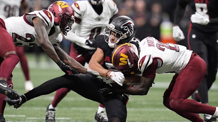 Washington Commanders cornerback Trey Amos and safety Quan Martin Washington Commanders cornerback Trey Amos and safety Quan Martin