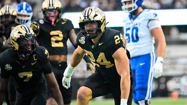 Nov 22, 2025; Nashville, Tennessee, USA; Vanderbilt Commodores linebacker Nick Rinaldi (24) celebrates the sack of Kentucky Wildcats quarterback Cutter Boley (8) during the first half at FirstBank Stadium. Mandatory Credit: Steve Roberts-Imagn Images Nov 22, 2025; Nashville, Tennessee, USA; Vanderbilt Commodores linebacker Nick Rinaldi (24) celebrates the sack of Kentucky Wildcats quarterback Cutter Boley (8) during the first half at FirstBank Stadium. Mandatory Credit: Steve Roberts-Imagn Images