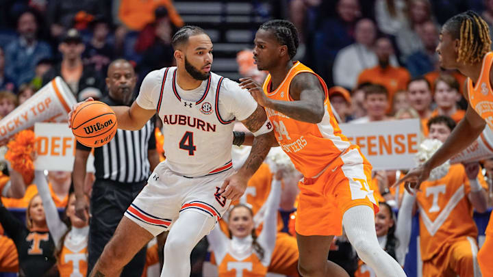Tennessee forward Felix Okpara (34) guards Auburn forward Johni Broome (4) during the first half of a Southeastern Conference tournament semifinal game at Bridgestone Arena in Nashville, Tenn., Saturday, March 15, 2025.