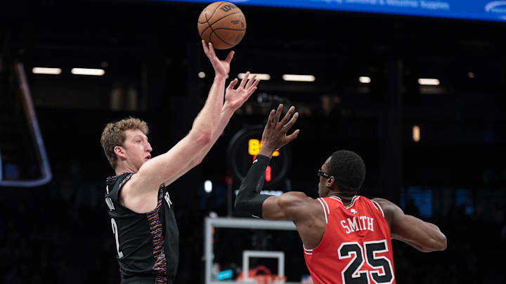 Jan 16, 2026; Brooklyn, New York, USA; Brooklyn Nets forward Danny Wolf (2) shoots the ball as Chicago Bulls forward Jalen Smith (25) defends during the first half at Barclays Center. Mandatory Credit: Vincent Carchietta-Imagn Images