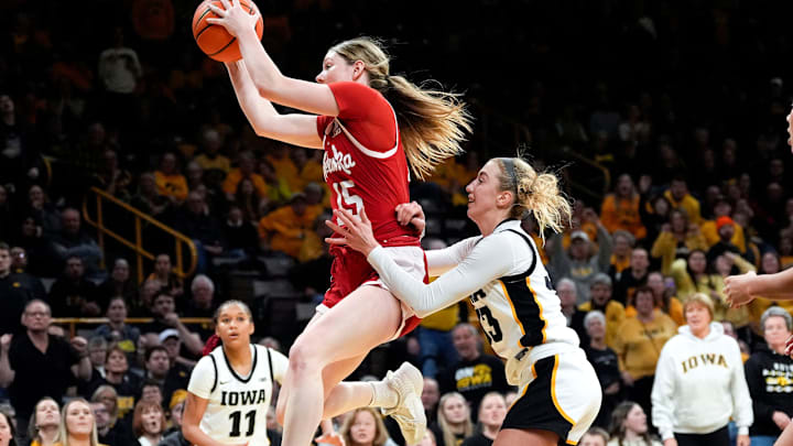 Nebraska Cornhuskers guard Kendall Moriarty (15) grabs a rebound against Iowa Hawkeyes guard Lucy Olsen (33) Thursday, Jan. 16, 2025 at Carver-Hawkeye Arena in Iowa City, Iowa.