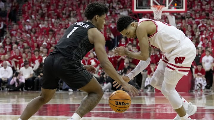 Michigan State guard Jeremy Fears Jr. (1) guards Wisconsin guard Nick Boyd (2) during the second half of their game Friday, February 13, 2026 at the Kohl Center in Madison, Wisconsin. Wisconsin beat 10th ranked Michigan State 92-71. Michigan State guard Jeremy Fears Jr. (1) guards Wisconsin guard Nick Boyd (2) during the second half of their game Friday, February 13, 2026 at the Kohl Center in Madison, Wisconsin. Wisconsin beat 10th ranked Michigan State 92-71.
