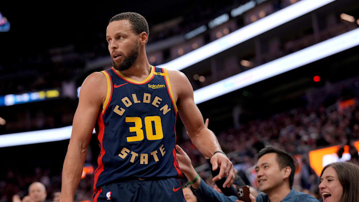 Jan 31, 2025; San Francisco, California, USA; Golden State Warriors guard Stephen Curry (30) reacts after being fouled against the Phoenix Suns in the fourth quarter at the Chase Center. Mandatory Credit: Cary Edmondson-Imagn Images