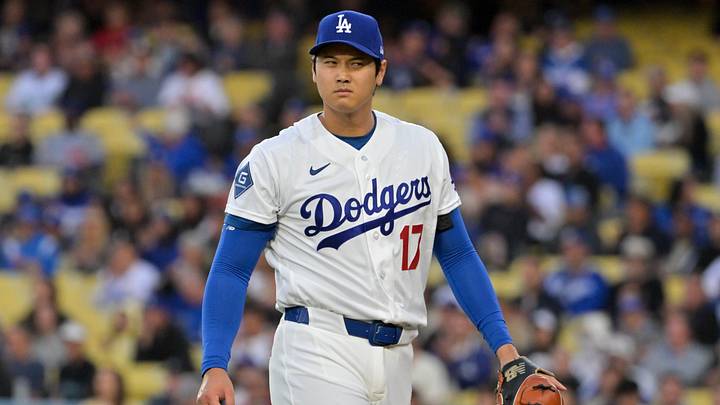 Apr 28, 2026; Los Angeles, California, USA; Los Angeles Dodgers pitcher Shohei Ohtani (17) walks back to the dugout after pitching against the Miami Marlins during the first inning at Dodger Stadium. Mandatory Credit: Jayne Kamin-Oncea-Imagn Images