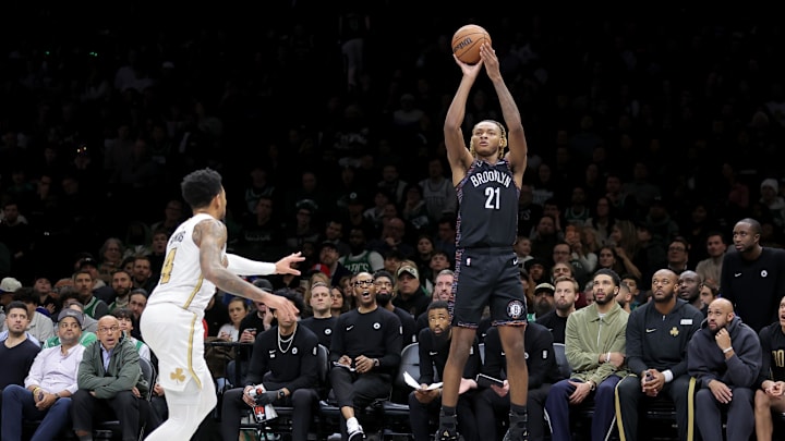 Jan 23, 2026; Brooklyn, New York, USA; Brooklyn Nets forward Noah Clowney (21) shoots a three point shot against Boston Celtics guard Anfernee Simons (4) during the fourth quarter at Barclays Center. Mandatory Credit: Brad Penner-Imagn Images Jan 23, 2026; Brooklyn, New York, USA; Brooklyn Nets forward Noah Clowney (21) shoots a three point shot against Boston Celtics guard Anfernee Simons (4) during the fourth quarter at Barclays Center. Mandatory Credit: Brad Penner-Imagn Images