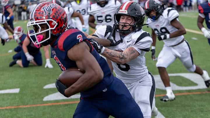 Aliquippa linebacker JJ Work (6) looks to drag down McKeesport running back Kemon Spell (3) in the first half of the WPIAL Class 4A championship game between Aliquippa and McKeesport Saturday, Nov. 15, 2025 at Pine-Richland Stadium in Gibsonia, Pa.
