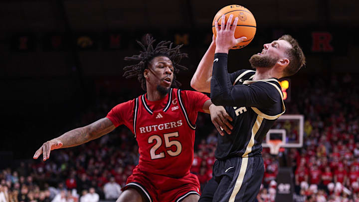 Purdue Boilermakers guard Braden Smith is guarded by Rutgers Scarlet Knights guard Jeremiah Williams Purdue Boilermakers guard Braden Smith is guarded by Rutgers Scarlet Knights guard Jeremiah Williams