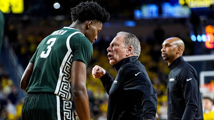 Michigan State head coach Tom Izzo talks to forward Cam Ward (3) after a play against Michigan during the first half at Crisler Center in Ann Arbor on Sunday, March 8, 2026.