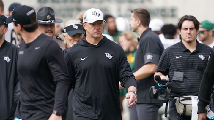 Nov 1, 2025; Waco, Texas, USA; UCF Knights head coach Scott Frost leaves the field following the game against the Baylor Bears at McLane Stadium. Mandatory Credit: Raymond Carlin III-Imagn Images Nov 1, 2025; Waco, Texas, USA; UCF Knights head coach Scott Frost leaves the field following the game against the Baylor Bears at McLane Stadium. Mandatory Credit: Raymond Carlin III-Imagn Images