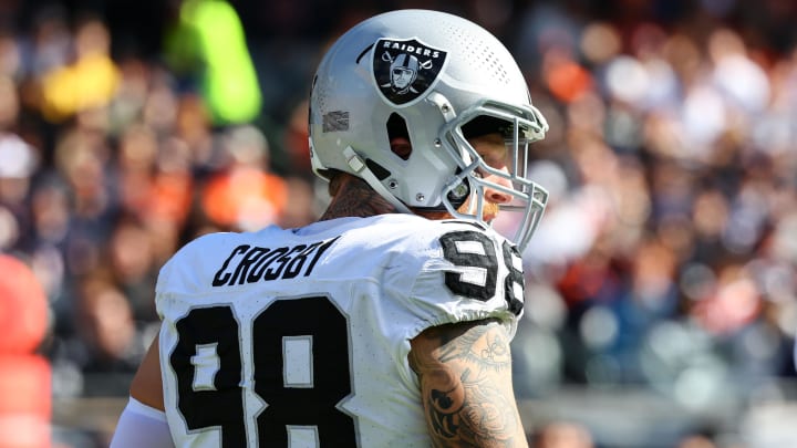 Oct 22, 2023; Chicago, Illinois, USA; Las Vegas Raiders defensive end Maxx Crosby (98) in the first half against the Chicago Bears at Soldier Field. Mandatory Credit: Mike Dinovo-USA TODAY Sports Oct 22, 2023; Chicago, Illinois, USA; Las Vegas Raiders defensive end Maxx Crosby (98) in the first half against the Chicago Bears at Soldier Field. Mandatory Credit: Mike Dinovo-USA TODAY Sports