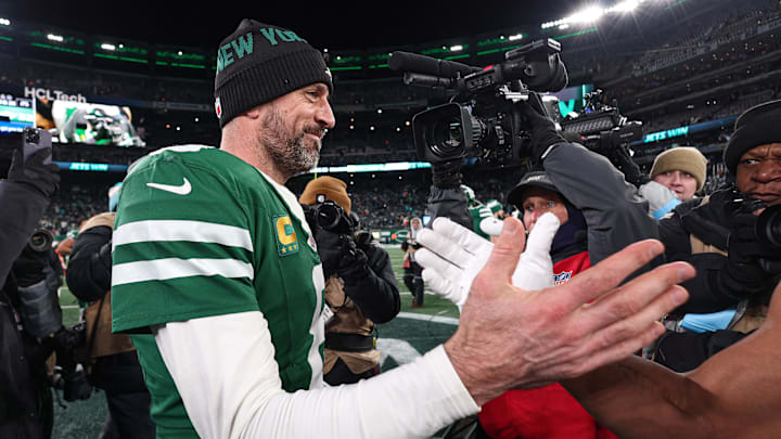 Jan 5, 2025; East Rutherford, New Jersey, USA; New York Jets quarterback Aaron Rodgers (8) shakes hands with a Miami Dolphins player after the game at MetLife Stadium. Mandatory Credit: Vincent Carchietta-Imagn Images Jan 5, 2025; East Rutherford, New Jersey, USA; New York Jets quarterback Aaron Rodgers (8) shakes hands with a Miami Dolphins player after the game at MetLife Stadium. Mandatory Credit: Vincent Carchietta-Imagn Images