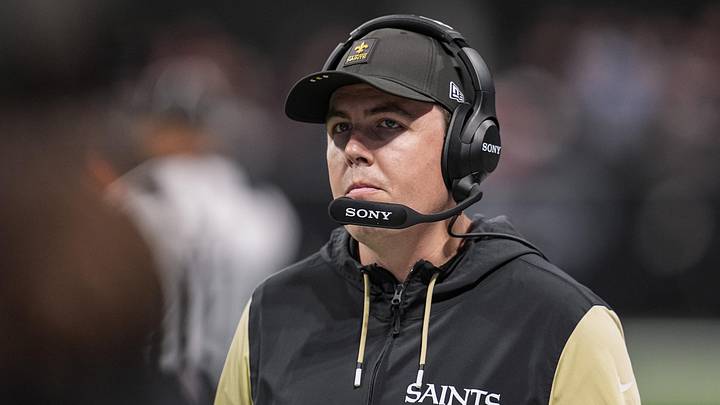 Jan 4, 2026; Atlanta, Georgia, USA; New Orleans Saints head coach Kellen Moore working on the sideline against the Atlanta Falcons during the first half at Mercedes-Benz Stadium. Mandatory Credit: Dale Zanine-Imagn Images