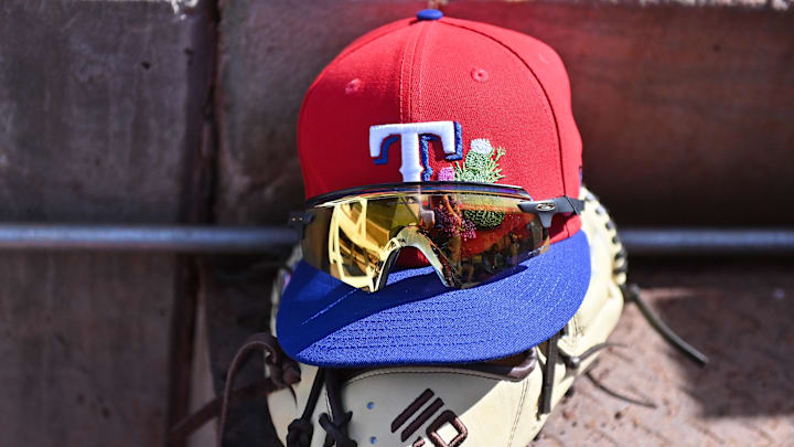 General view of a Texas Rangers hat during a spring training game. General view of a Texas Rangers hat during a spring training game.