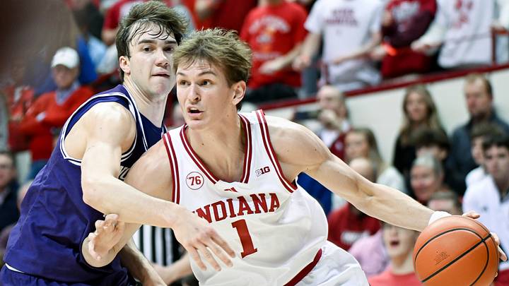 Feb 24, 2026; Bloomington, Indiana, USA; Indiana Hoosiers forward Reed Bailey (1) dribbles against Northwestern Wildcats guard Angelo Ciaravino (44) during the first half at Simon Skjodt Assembly Hall. Mandatory Credit: Robert Goddin-Imagn Images Feb 24, 2026; Bloomington, Indiana, USA; Indiana Hoosiers forward Reed Bailey (1) dribbles against Northwestern Wildcats guard Angelo Ciaravino (44) during the first half at Simon Skjodt Assembly Hall. Mandatory Credit: Robert Goddin-Imagn Images