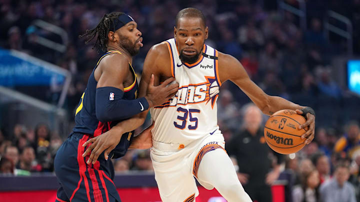 Jan 31, 2025; San Francisco, California, USA; Phoenix Suns forward Kevin Durant (35) dribbles the ball next to Golden State Warriors guard Buddy Hield (7) in the first quarter at the Chase Center. Mandatory Credit: Cary Edmondson-Imagn Images Jan 31, 2025; San Francisco, California, USA; Phoenix Suns forward Kevin Durant (35) dribbles the ball next to Golden State Warriors guard Buddy Hield (7) in the first quarter at the Chase Center. Mandatory Credit: Cary Edmondson-Imagn Images