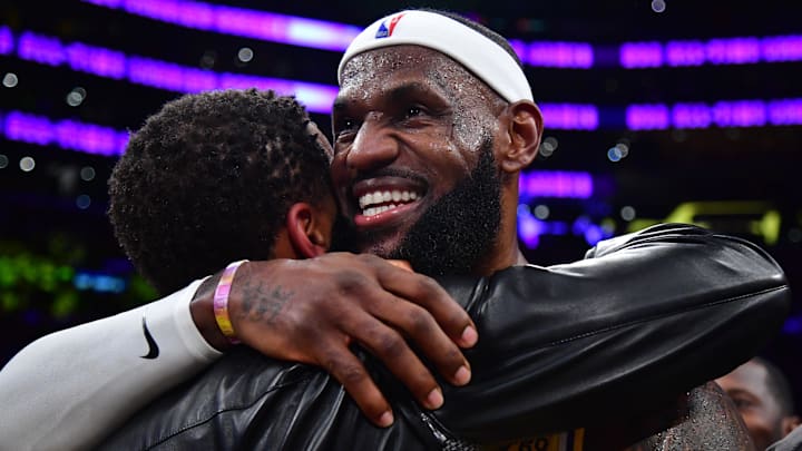 Feb 7, 2023; Los Angeles, California, USA; Los Angeles Lakers forward LeBron James (6) hugs agent Rich Paul after breaking the all-time scoring record in the third quarter against the Oklahoma City Thunder at Crypto.com Arena. Mandatory Credit: Gary A. Vasquez-Imagn Images