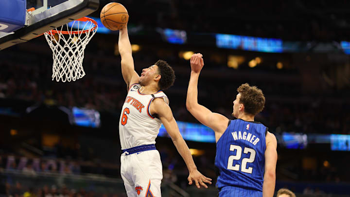 Mar 23, 2023; Orlando, Florida, USA;  New York Knicks guard Quentin Grimes (6) dunks the ball