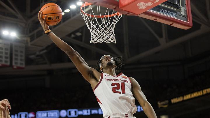 Oct 24, 2026; Fayetteville, AK, USA;  Arkansas Razorbacks forward Cooper Bowser (21) goes up for a layup during the first half against the Gonzaga Bulldogs at Bud Walton Arena.  Mandatory Credit: Brett Rojo-Imagn Images