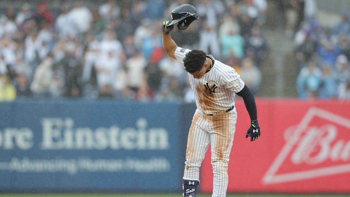 Sep 28, 2024; Bronx, New York, USA; New York Yankees right fielder Juan Soto (22) reacts after being tagged out trying to stretch his RBI single into a double during the seventh inning against the Pittsburgh Pirates at Yankee Stadium. Mandatory Credit: Brad Penner-Imagn Images