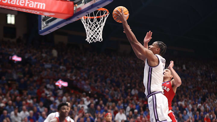 Kansas State senior forward David N'Guessan (1) lays in for two against Kansas in the second half of the Sunflower Showdown.