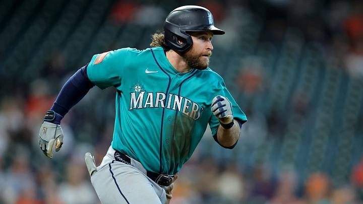 May 14, 2026; Houston, Texas, USA; Seattle Mariners third baseman Brendan Donovan (33) hits a triple against the Houston Astros during the third inning at Daikin Park. Mandatory Credit: Erik Williams-Imagn Images