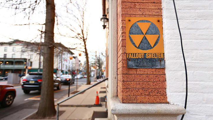 A fallout shelter sign left over from the Cold War still visible in Brooklyn, New York.