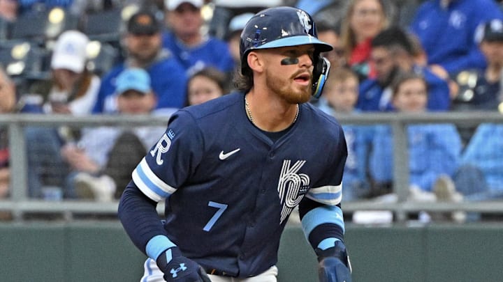 Apr 25, 2025; Kansas City, Missouri, USA;  Kansas City Royals Bobby Witt Jr. (7) leads off first base in the first inning against the Houston Astros at Kauffman Stadium. Mandatory Credit: Peter Aiken-Imagn Images