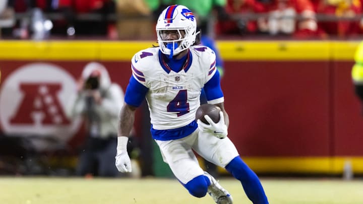 Jan 26, 2025; Kansas City, MO, USA; Buffalo Bills running back James Cook (4) against the Kansas City Chiefs during the AFC Championship game at GEHA Field at Arrowhead Stadium. Mandatory Credit: Mark J. Rebilas-Imagn Images