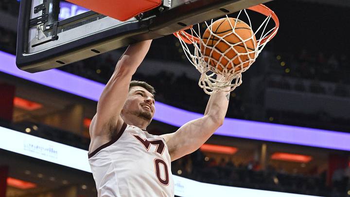 Mar 5, 2024; Louisville, Ky.; Virginia Tech guard Hunter Cattoor (0) dunks against Louisville.