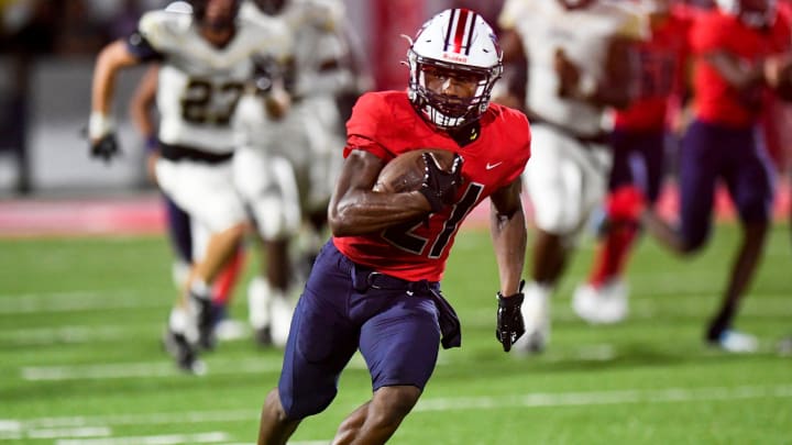 Pike Road's Anthony Rogers (21) scores the winning touchdown late on a long run against Wetumpka High School during their game in Pike Road, Ala., on Friday evening September 2, 2022.
Pr25 Pike Road's Anthony Rogers (21) scores the winning touchdown late on a long run against Wetumpka High School during their game in Pike Road, Ala., on Friday evening September 2, 2022.
Pr25