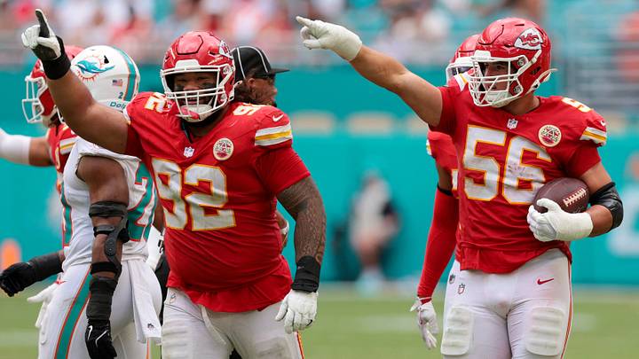 Sep 27, 2026; Miami Gardens, Florida, USA;  Kansas City Chiefs defensive end George Karlaftis (56) celebrates after recovering a fumble against the Miami Dolphins during the fourth quarter at Hard Rock Stadium.  Mandatory Credit: Sam Navarro-Imagn Images