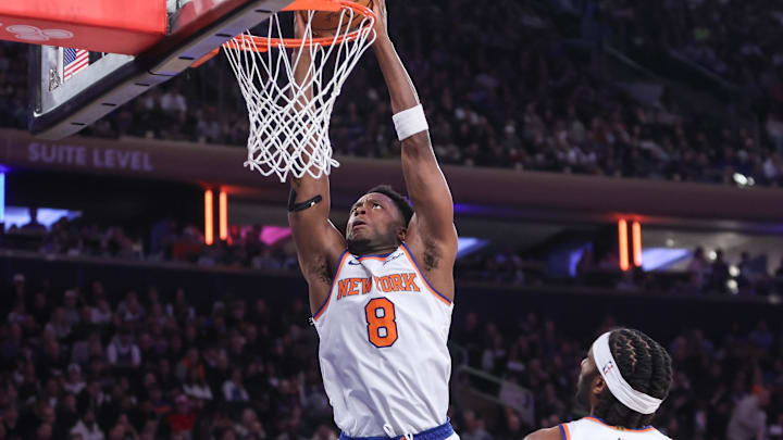 Jan 25, 2025; New York, New York, USA;  New York Knicks forward OG Anunoby (8) dunks against the Sacramento Kings in the second quarter at Madison Square Garden. Mandatory Credit: Wendell Cruz-Imagn Images