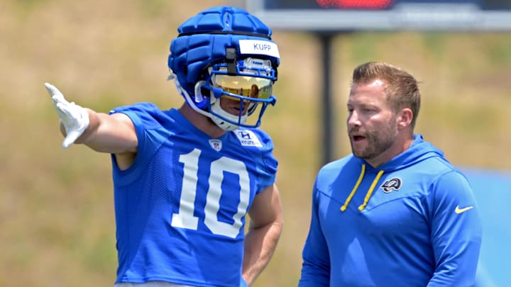 May 28, 2024; Thousand Oaks, CA, USA; Los Angeles Rams wide receiver Cooper Kupp (10) talks with head coach Sean McVay during OTAs at the team training facility at California Lutheran University. Mandatory Credit: Jayne Kamin-Oncea-Imagn Images May 28, 2024; Thousand Oaks, CA, USA; Los Angeles Rams wide receiver Cooper Kupp (10) talks with head coach Sean McVay during OTAs at the team training facility at California Lutheran University. Mandatory Credit: Jayne Kamin-Oncea-Imagn Images