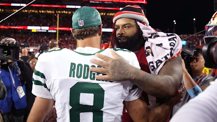 Sep 9, 2024; Santa Clara, California, USA; New York Jets quarterback Aaron Rodgers (8) greets San Francisco 49ers offensive tackle Trent Williams (71) after a game at Levi's Stadium. Mandatory Credit: David Gonzales-Imagn Images