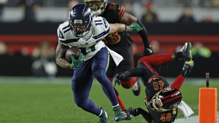 Jan 3, 2026; Santa Clara, California, USA; Seattle Seahawks wide receiver Jaxon Smith-Njigba (11) makes a catch against San Francisco 49ers linebacker Tatum Bethune (48) during the first half at Levi's Stadium. Mandatory Credit: Sergio Estrada-Imagn Images Jan 3, 2026; Santa Clara, California, USA; Seattle Seahawks wide receiver Jaxon Smith-Njigba (11) makes a catch against San Francisco 49ers linebacker Tatum Bethune (48) during the first half at Levi's Stadium. Mandatory Credit: Sergio Estrada-Imagn Images