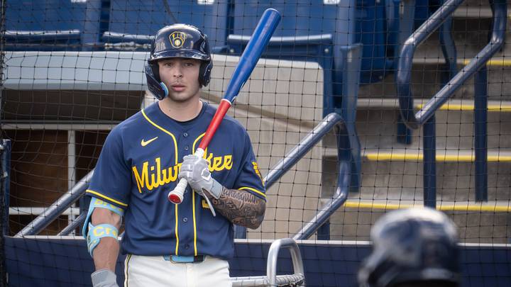 Milwaukee Brewers infield prospect Andrew Fischer waits to bat during spring training workouts Tuesday, February 17, 2026, at American Family Fields of Phoenix in Phoenix, Arizona. Milwaukee Brewers infield prospect Andrew Fischer waits to bat during spring training workouts Tuesday, February 17, 2026, at American Family Fields of Phoenix in Phoenix, Arizona.