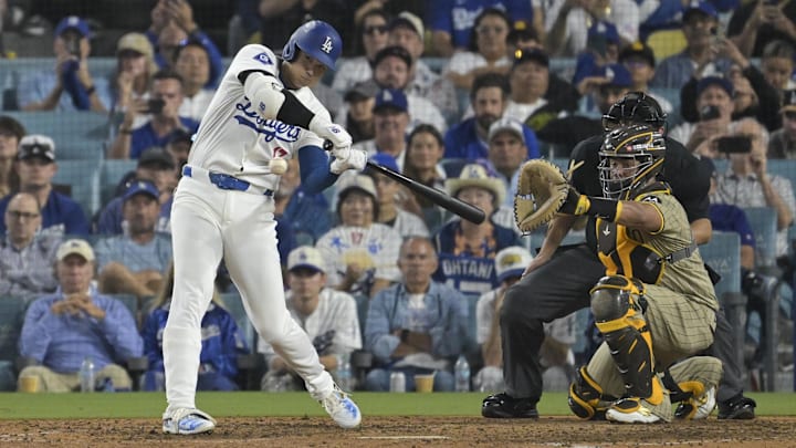 Oct 5, 2024; Los Angeles, California, USA; Los Angeles Dodgers designated hitter Shohei Ohtani (17) swings in the eighth inning against the San Diego Padres during game one of the NLDS for the 2024 MLB Playoffs at Dodger Stadium. Mandatory Credit: Jayne Kamin-Oncea-Imagn Images