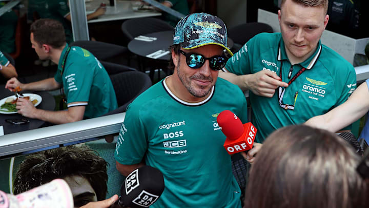 May 2, 2024; Miami Gardens, Florida, USA; Aston Matrin driver Fernando Alonso (14) speaks to the