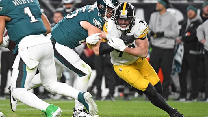 Dec 15, 2024; Philadelphia, Pennsylvania, USA; Philadelphia Eagles offensive tackle Lane Johnson (65) battles with Pittsburgh Steelers linebacker T.J. Watt (90) during the second quarter at Lincoln Financial Field. Mandatory Credit: Eric Hartline-Imagn Images