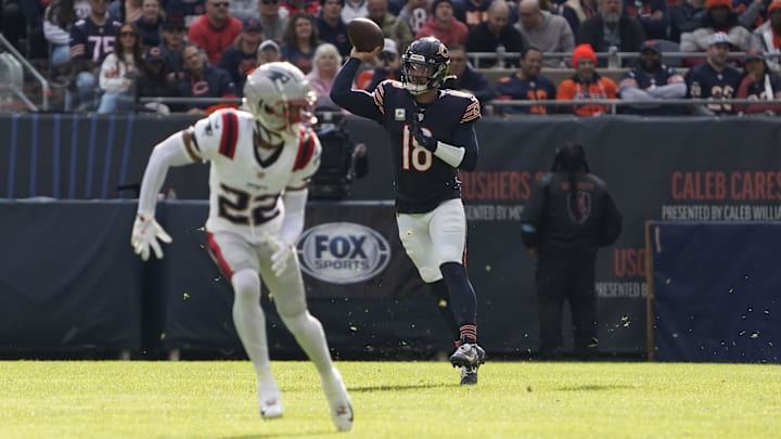 Caleb Williams pump-fakes on the run and throws in Sunday's 19-3 loss to New England. Caleb Williams pump-fakes on the run and throws in Sunday's 19-3 loss to New England.