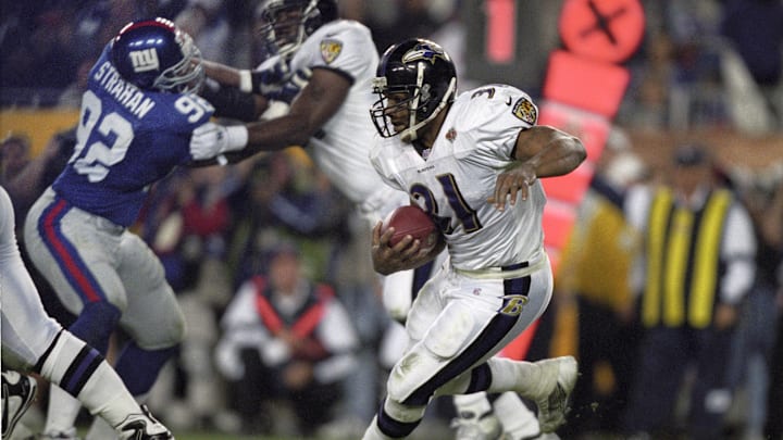 Jan 28, 2001; Tampa, FL, USA; FILE PHOTO; Baltimore Ravens running back Jamal Lewis (84) carries the ball against the New York Giants during Super Bowl XXXV. The Ravens defeated the Giants 34-7 at Raymond James Stadium. Mandatory Credit: Imagn Images Jan 28, 2001; Tampa, FL, USA; FILE PHOTO; Baltimore Ravens running back Jamal Lewis (84) carries the ball against the New York Giants during Super Bowl XXXV. The Ravens defeated the Giants 34-7 at Raymond James Stadium. Mandatory Credit: Imagn Images