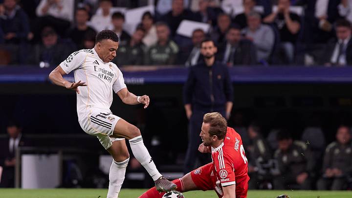 Kylian Mbappe (L) of Real Madrid CF and Harry Kane (R) of FC
