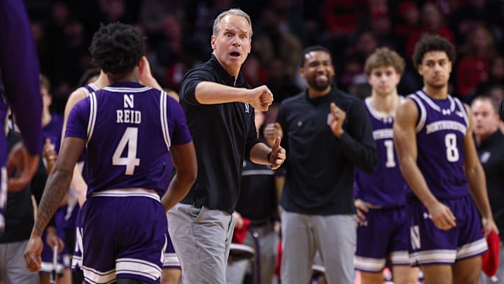 Jan 11, 2026; Piscataway, New Jersey, USA; Northwestern Wildcats head coach Chris Collins reacts after a call during the second half against the Rutgers Scarlet Knights at Jersey Mike's Arena. Mandatory Credit: Vincent Carchietta-Imagn Images
