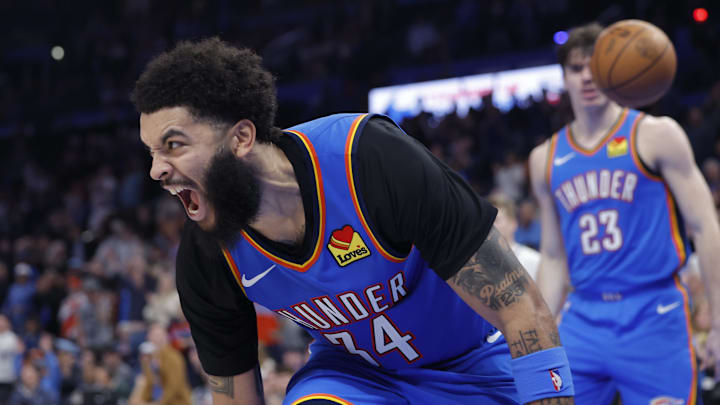 Dec 22, 2025; Oklahoma City, Oklahoma, USA; Oklahoma City Thunder guard Kenrich Williams (34) screams after scoring a basket against the Memphis Grizzlies during the second half at Paycom Center. Mandatory Credit: Alonzo Adams-Imagn Images