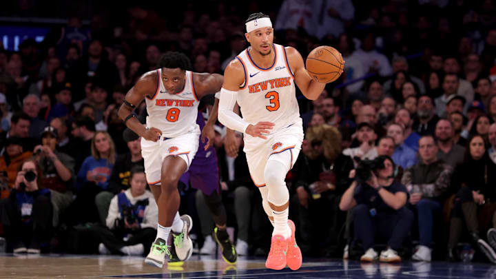 Jan 8, 2025; New York, New York, USA; New York Knicks guard Josh Hart (3) brings the ball up court against the Toronto Raptors with forward OG Anunoby (8) during the third quarter at Madison Square Garden. Mandatory Credit: Brad Penner-Imagn Images