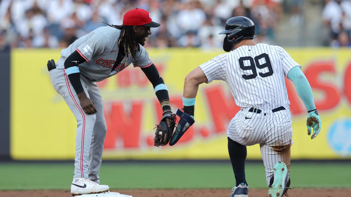 Jul 2, 2024; Bronx, New York, USA; Cincinnati Reds shortstop Elly De La Cruz (44) greets New York Yankees designated hitter Aaron Judge (99) at second base after forcing him out to end the first inning at Yankee Stadium. Mandatory Credit: Brad Penner-USA TODAY Sports