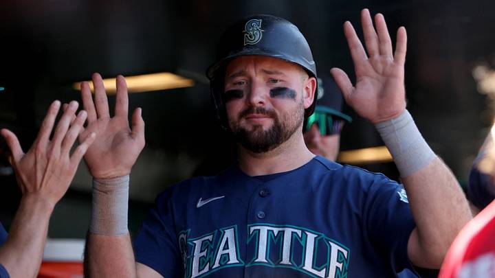 Sep 13, 2026; West Sacramento, California, USA; Seattle Mariners designated hitter Cal Raleigh (29) celebrates with teammates in the dugout after being walked in to score a run against Athletics pitcher Luis Medina (not pictured) during the fifth inning at Sutter Health Park. Mandatory Credit: Dennis Lee-Imagn Images Sep 13, 2026; West Sacramento, California, USA; Seattle Mariners designated hitter Cal Raleigh (29) celebrates with teammates in the dugout after being walked in to score a run against Athletics pitcher Luis Medina (not pictured) during the fifth inning at Sutter Health Park. Mandatory Credit: Dennis Lee-Imagn Images