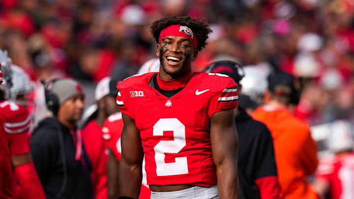 Ohio State safety Caleb Downs smiles during a game against Purdue. Ohio State safety Caleb Downs smiles during a game against Purdue.