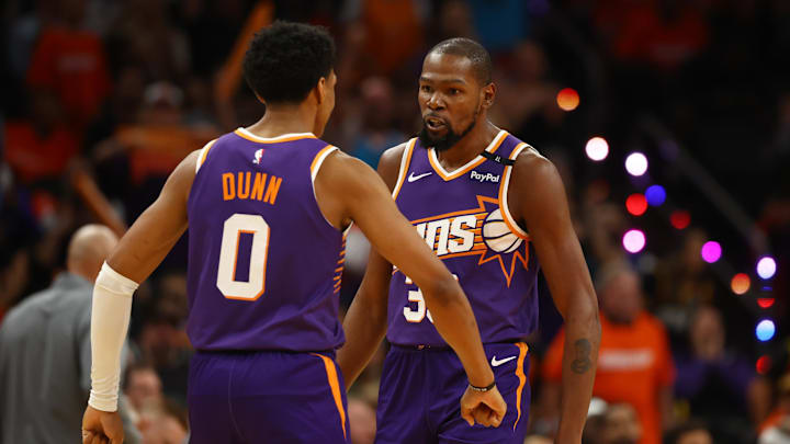 Oct 26, 2024; Phoenix, Arizona, USA; Phoenix Suns forward Kevin Durant (35) celebrates with forward Ryan Dunn (0) against the Dallas Mavericks in the second half of the home opener at Footprint Center. Mandatory Credit: Mark J. Rebilas-Imagn Images Oct 26, 2024; Phoenix, Arizona, USA; Phoenix Suns forward Kevin Durant (35) celebrates with forward Ryan Dunn (0) against the Dallas Mavericks in the second half of the home opener at Footprint Center. Mandatory Credit: Mark J. Rebilas-Imagn Images